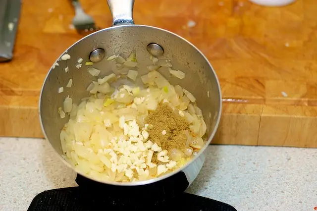 Add the garlic and the cumin
