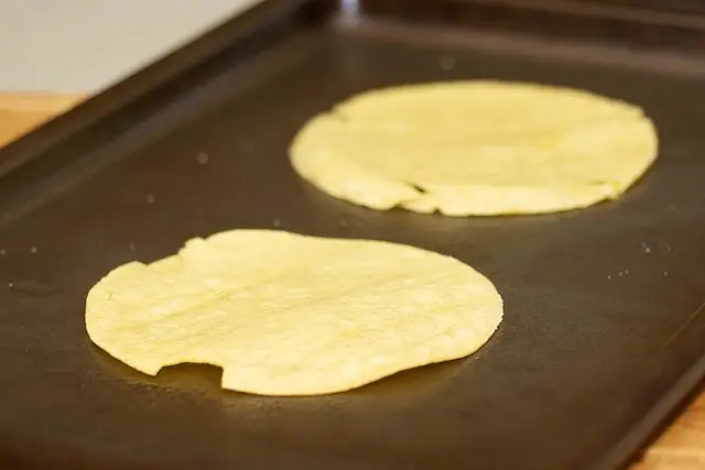 Coat tortillas with cooking spray