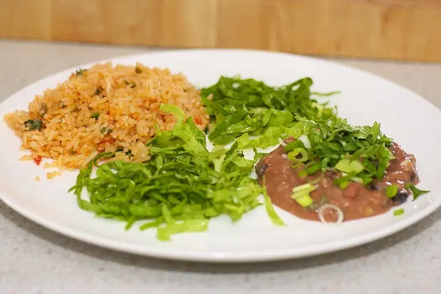 Add the side of beans and rice
