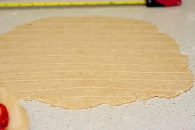 To prepare the lattice top and preheat the oven to 425 degree F.