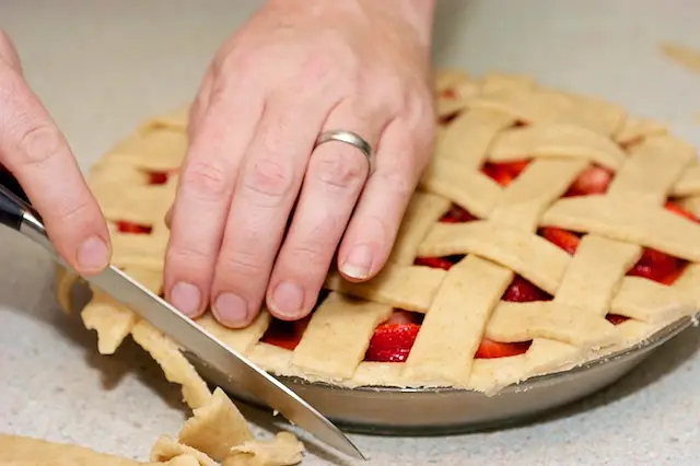 Trim any overhanging crust.