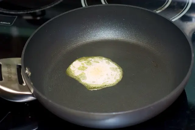 Heat the butter and oil in the skillet