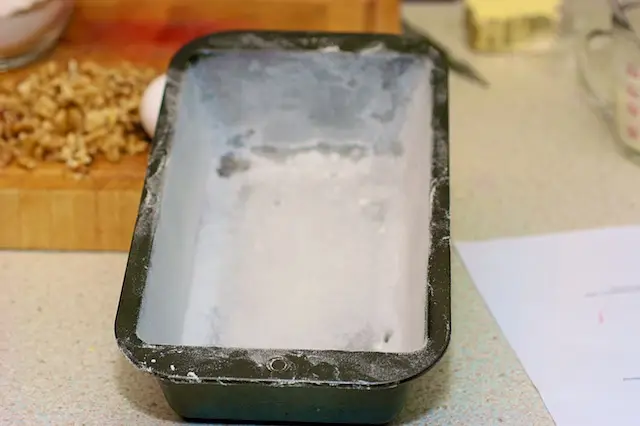 This is a well buttered and floured loaf pan.