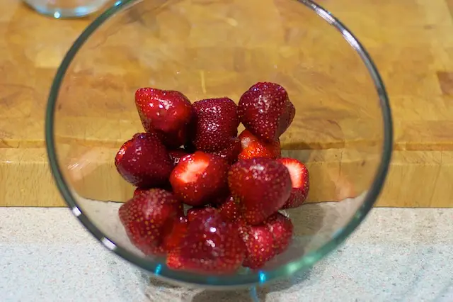 Prepare the 1 quart of the strawberries...
