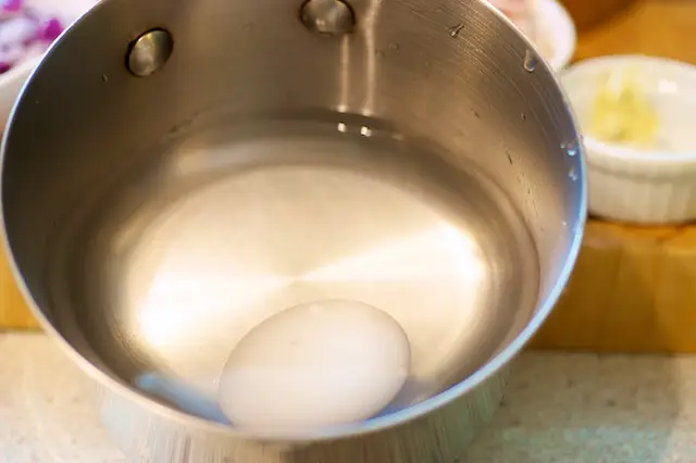 Add egg into the water...