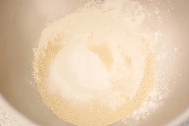 Add 1 cup flour, yeast, and salt in a mixing bowl, stir until well mixed...