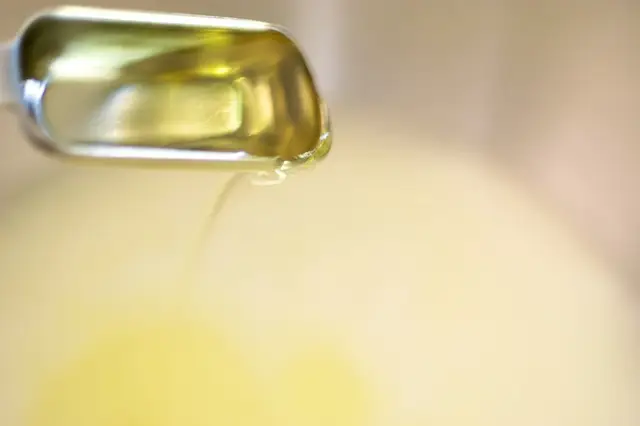 Add 2 tablespoons of vegetable oil...