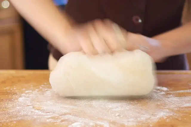Keep kneading, add more flour if the dough is still too sticky...