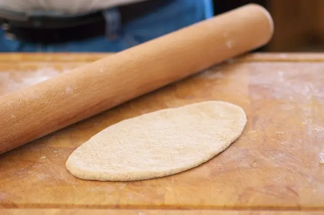 Let rest 5 minutes. Roll out each ball to a ¼-inch thick round...