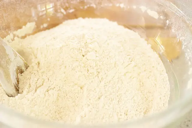 Stir well the sifted flour mixture until well mixed, and set aside...
