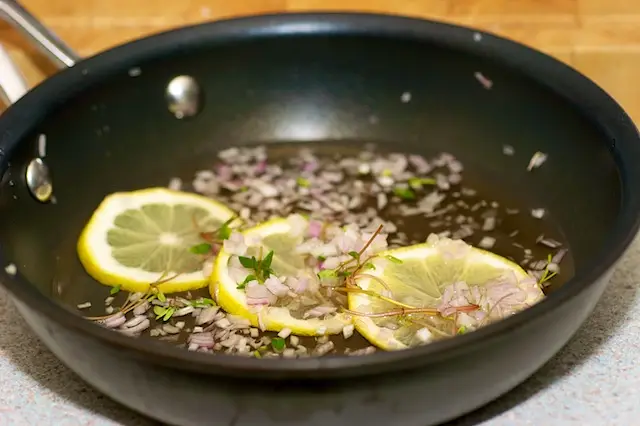 Add the sherry or wine and water