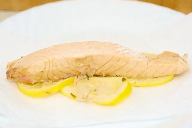 Remove salmon to paper towel, cover to keep warm
