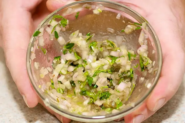 and add to the herb dressing mixture and combine