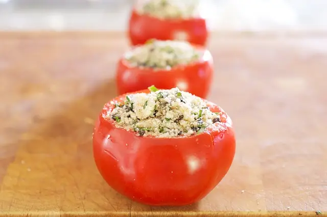 Stuff each of the prepared tomato shells, pack it in!
