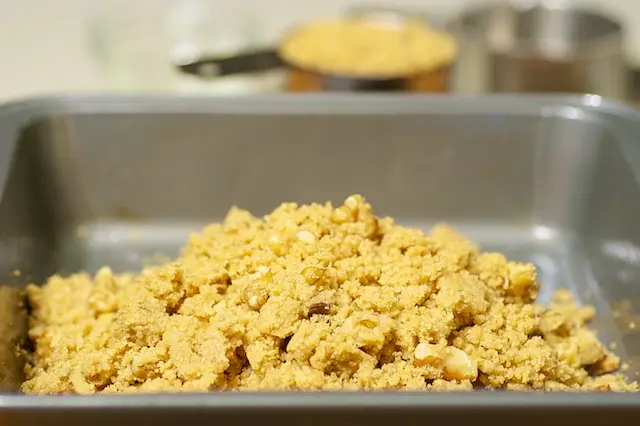 Transfer the mixture into a 8-inch square baking dish that has been oiled.