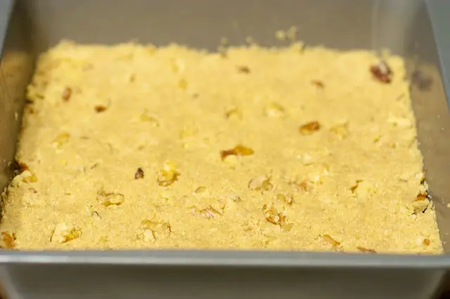 Press the crumbs firmly and evenly.