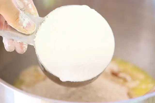 Add 1 cup of each whole wheat and all-purpose flour.