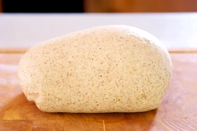 Gently punch down the dough, then shape it.