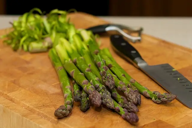 Prepare the asparagus first.