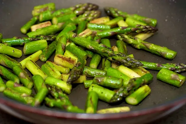 Cook until the asparagus is browned and almost tender, 4 to 5 minutes, stirring once.