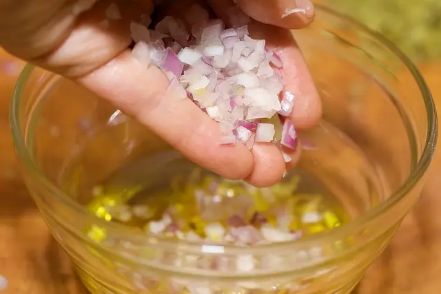 Add the minced shallots or red onions.
