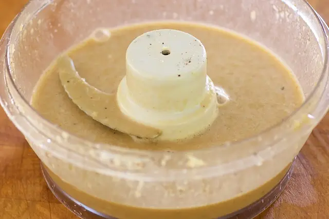 In a blender or food processor, blend the marinade ingredients together with salt and pepper to taste.  