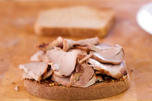 Place the leftover grilled pork tenderloin as needed over the mustard. 