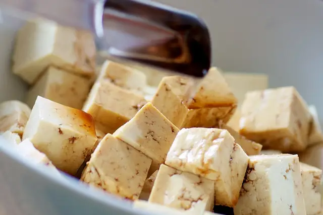 Add the soy sauce, vinegar...