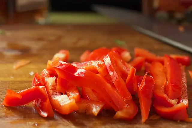 Slice the red bell pepper.
