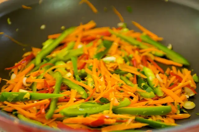 Cook for 3 to 5 minutes, until the vegetables are tender but still crisp.
