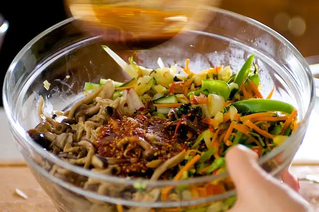 Pour the dressing over.