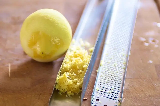 Meanwhile freshly grate some lemon zest.