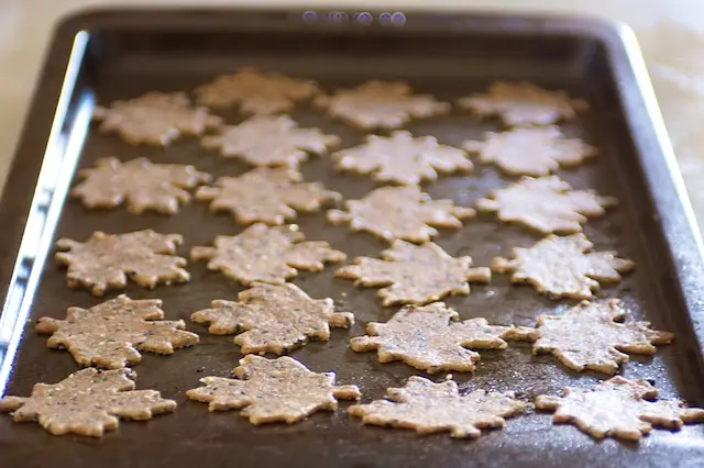 Transfer crackers with a spatula onto prepared baking sheets. Keep ¼ inch space.