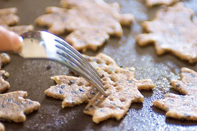 Pierce the crackers with a fork.
