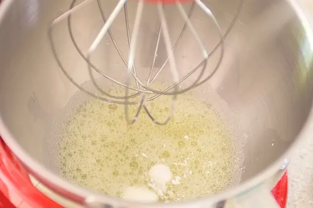 Beat egg whites until foarmy, add cream of tartar.