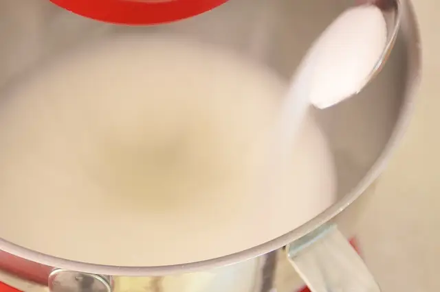 Gradually beat in remaining 1 cup sugar, 2 tablespoons at time.