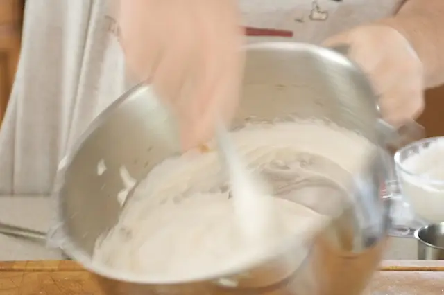 Fold in vanilla and almond extracts.  