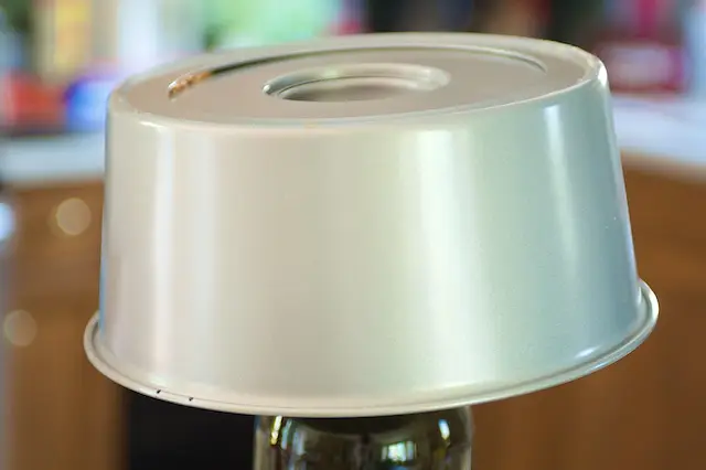 Invert pan over bottle or inverted funnel and let stand until thoroughly cool. 