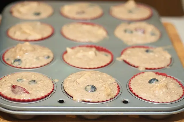 Spoon the batter into prepared muffin pan.