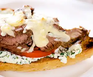Open-face Flank Steak Sandwiches with Herbed Goat Cheese & Tomatoes