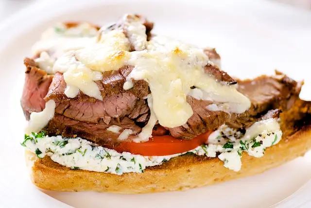Open-face Flank Steak Sandwiches with Herbed Goat Cheese & Tomatoes
