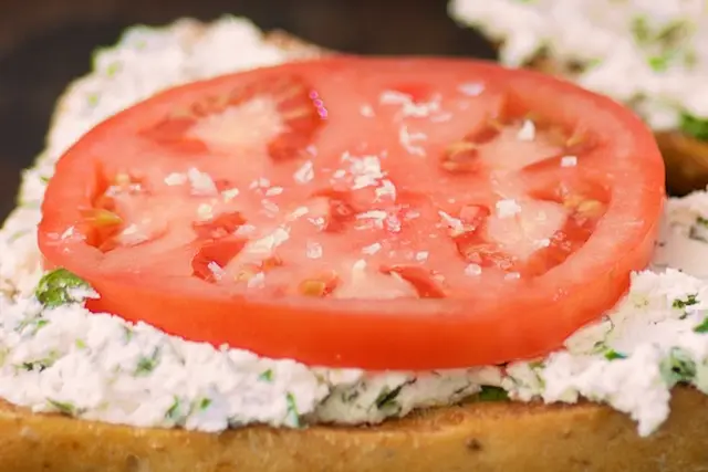 Make sure to season that tomato with flaky salt