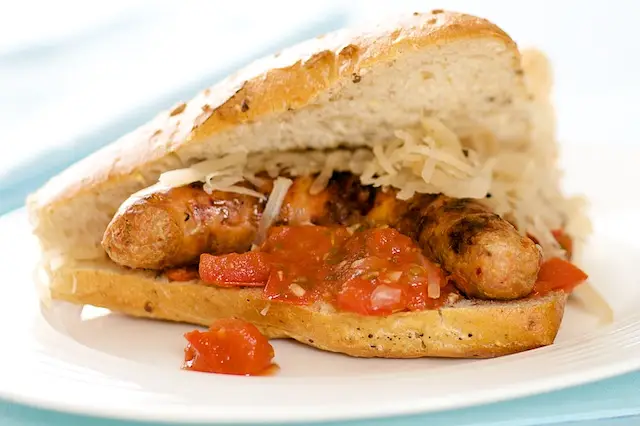 Grilled Sausage Sandwiches with Tomato Jam & Sauerkraut