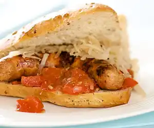 Grilled Sausage Sandwiches with Tomato Jam & Sauerkraut