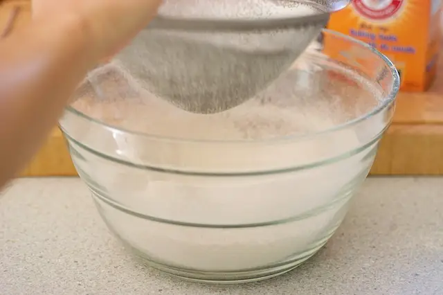 Sift the flour, baking powder, and baking soda together.