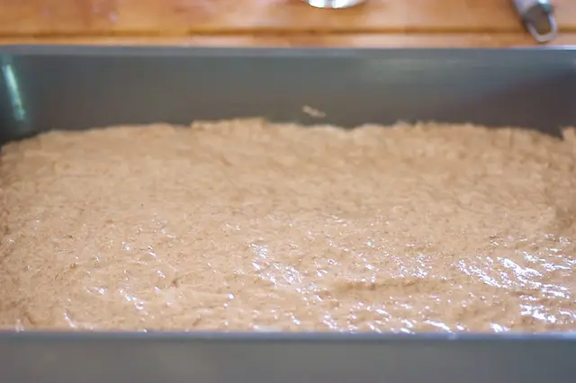 Spread the batter evenly into the prepared <a href="/how-to/know-your-baking-pans-tips-and-buyers-guide" title="Know your baking pans, tips and buyers guide">cake pan</a> with a rubber spatula.