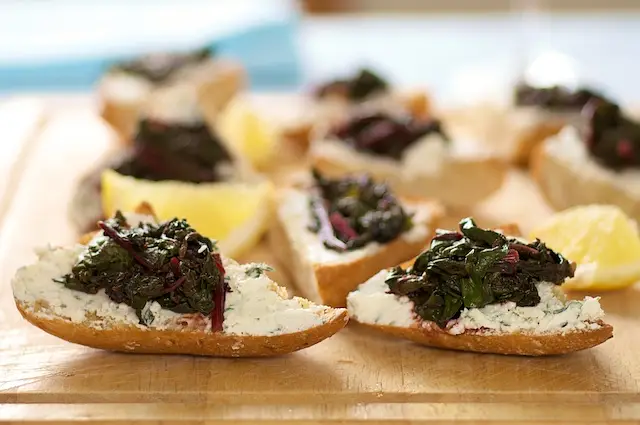 Sauteed Beet Greens & Herbed Goat Cheese Crostini 