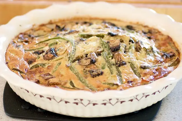 Bake in a 400 degrees F oven until knife inserted between center and edge comes out clean, 30 to 35 minutes. 