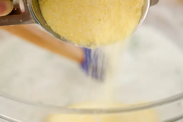 Add the corn meal.