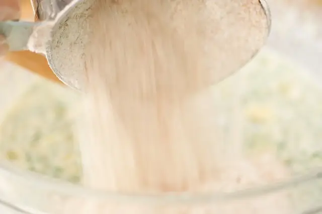 Add half of the flour.
